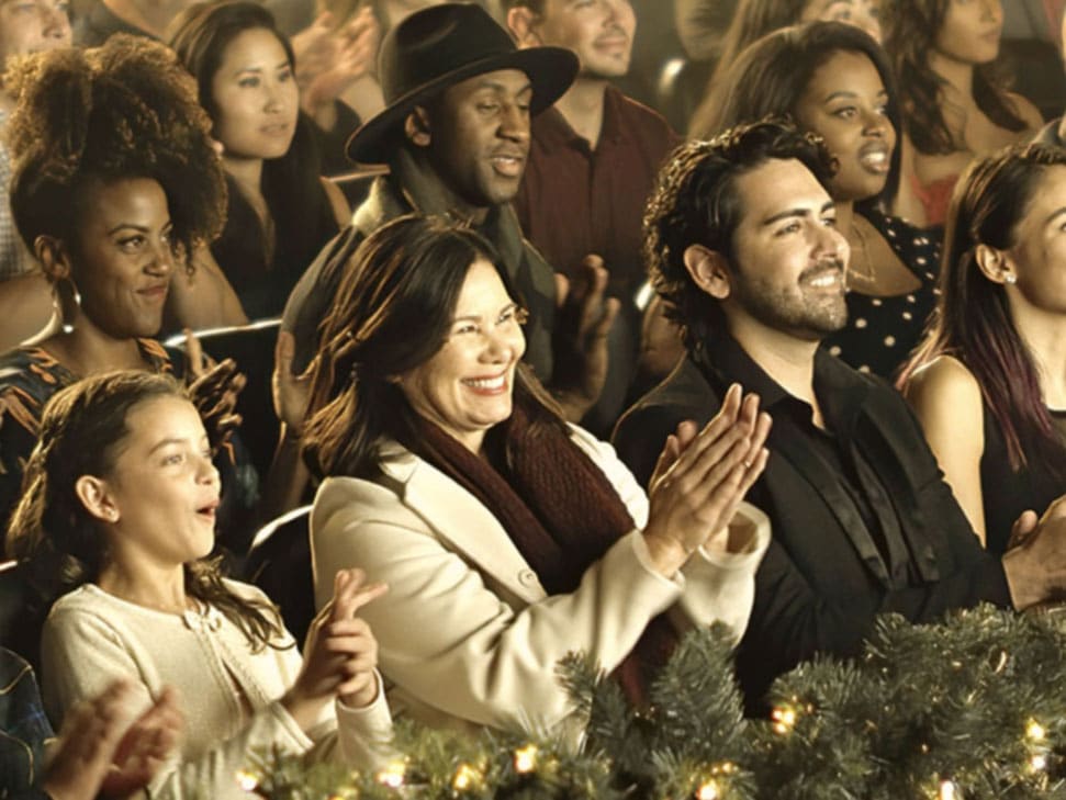 Photo showing a group of people celebrating at one of Hunter College's outdoor event venues in NYC
